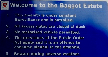 A cropped photograph showing the entrance sign at the Baggot Estate